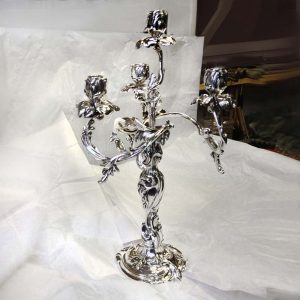 Orfèvre restaurateur de chandeliers anciens en argent ou métal argenté à Paris